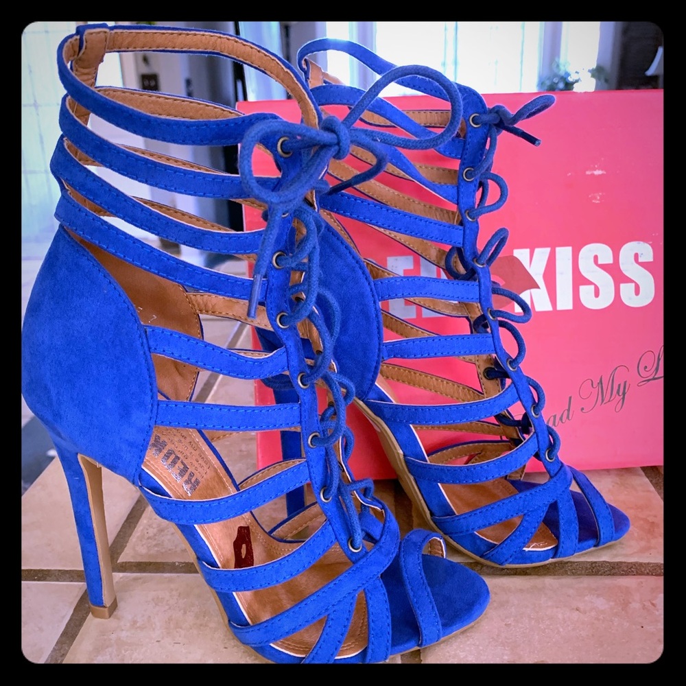 Blue suede lace up 4” heels.  Brand new